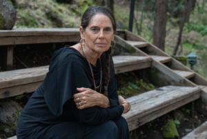 Daria Halprin sitting on bench